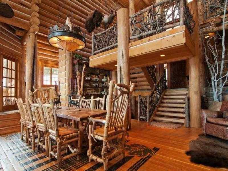 Whole tree furniture with a whole tree balustrade in a log cabin.  What do you think of the effect?