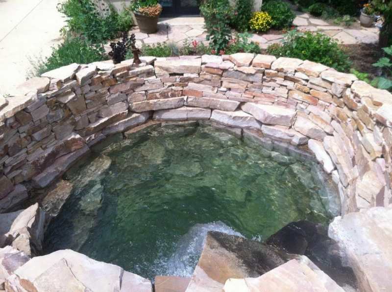 The same well finished and full of crystal clear water