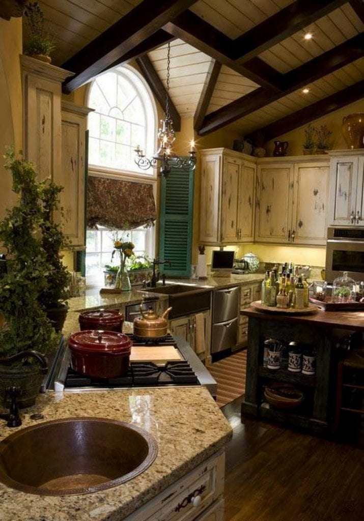 There is so much going on in this kitchen that it makes it hard for me to focus on one particular feature (and there are quite a few).  Is this a kitchen where less would have been more, or is it okay as is?