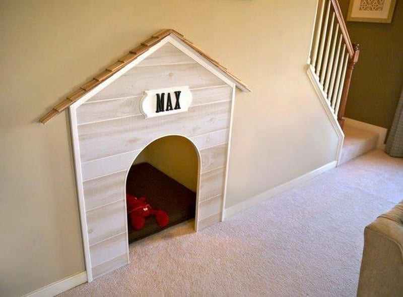 Just what any pampered pooch deserves - their very own den under the stairs.  Better still, make it big enough for your partner to sleep in when