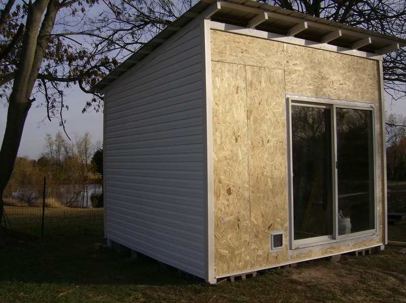 How To Build A DIY Pallet Shed - Attached siding