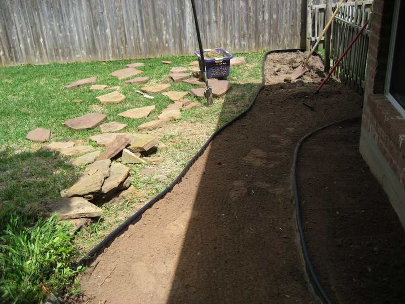 DIY Backyard Walkway - Cleaning the area