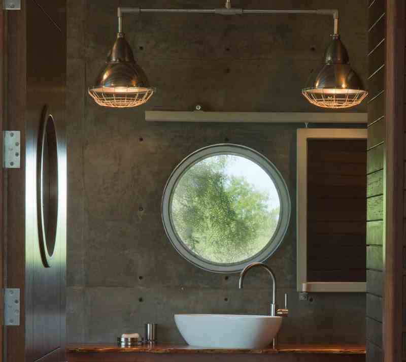 The mirror slides across to sit in front of the basin when the view becomes boring!