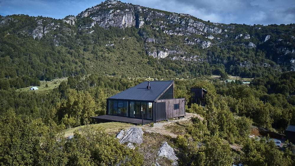 GZ1 House is framed by gorgeous views of the surrounding mountain and lake.