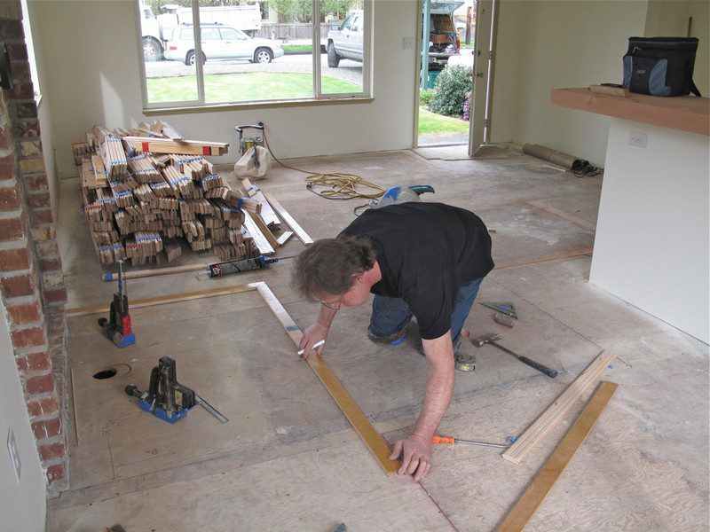 working on reclaimed wood flooring