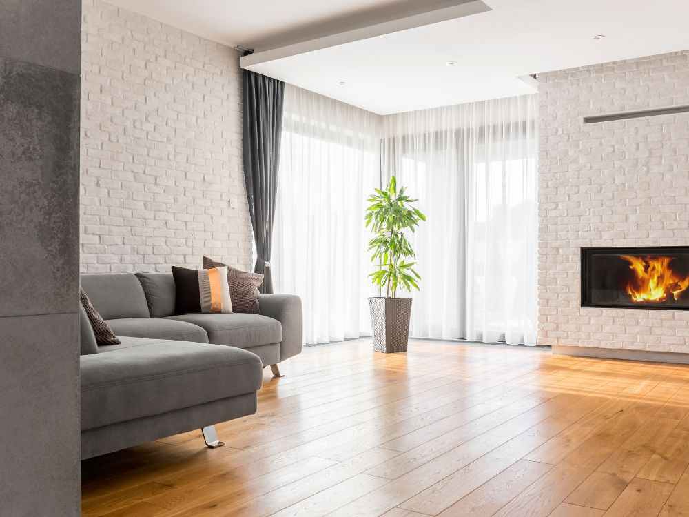 An image of an open-concept floor plan for a living room. 