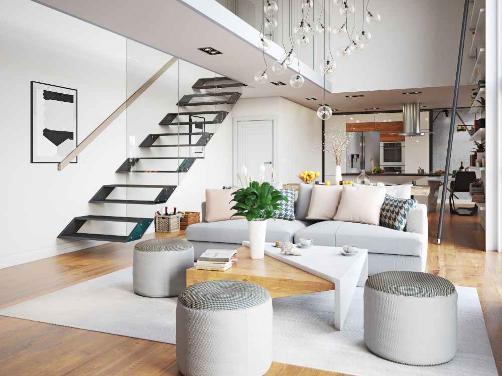 An image of an open-concept floor plan with a transparent stairs. 