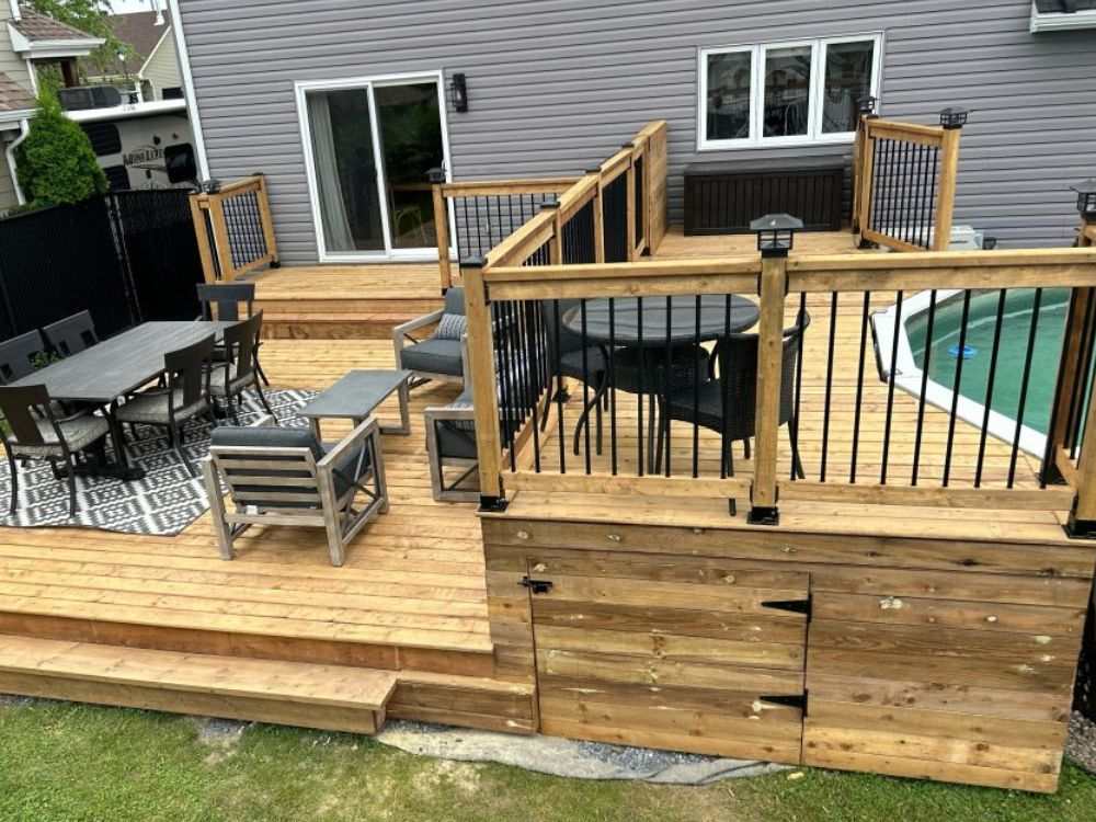 An image of a large deck with skirted structures. 