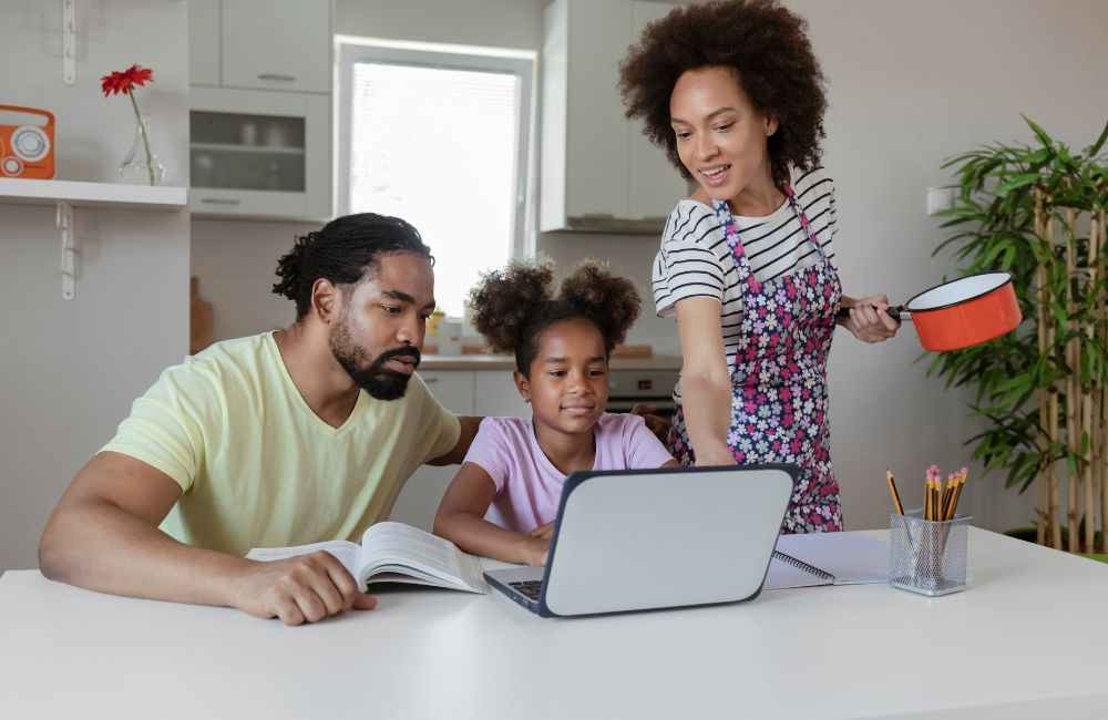 An image of parents doing homeschool programs. 