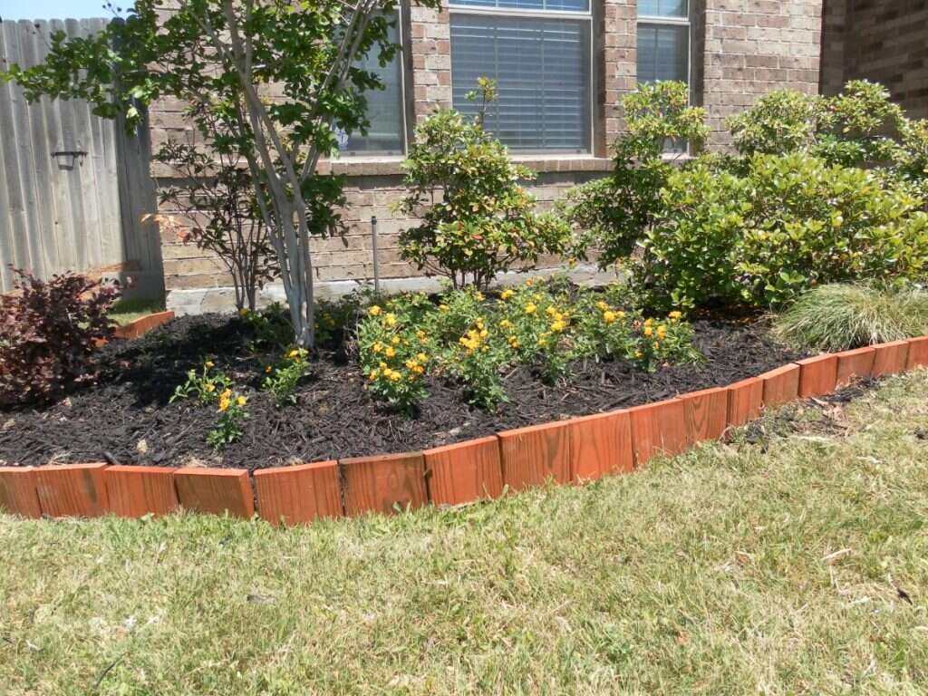 An image of brings used for garden edging.