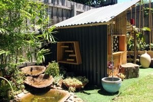 The cubby in its natural setting next to a pond