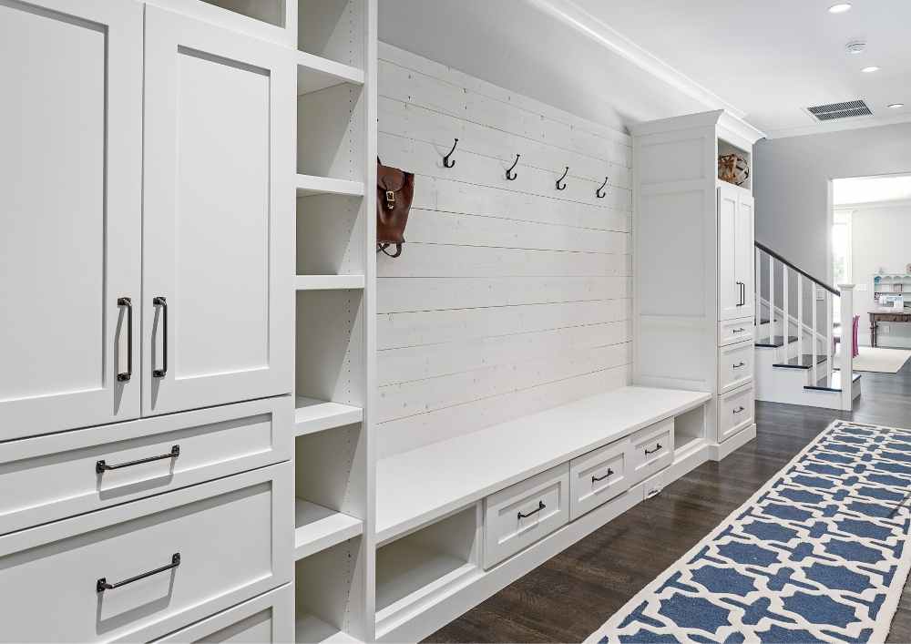 A mud room acts as a transitional space, preventing dirt, mud, and moisture from being tracked into the main living areas of the home.