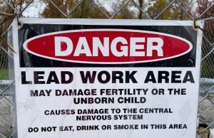 An image of a danger sign for an article about exposure to lead paint.
