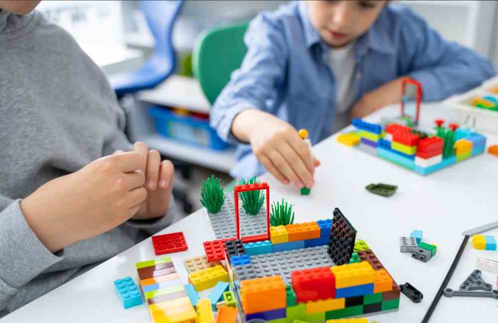 An image of kids building a LEGO set.