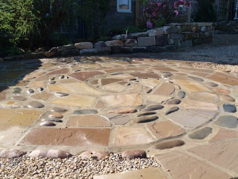 Vortex patio, broken Indian flagstone and cobbles
