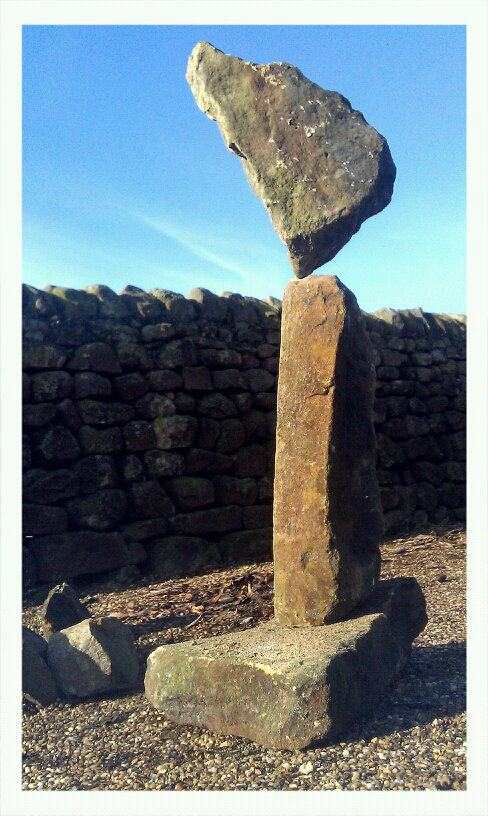 Stone balancing, 3 through stones from a drystone wall