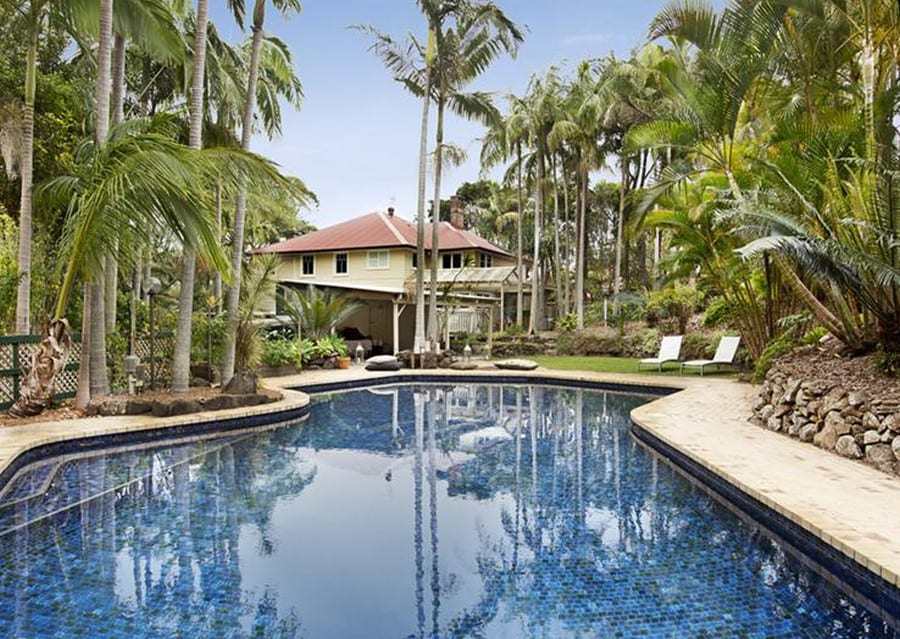 Looking back to the home over the pool