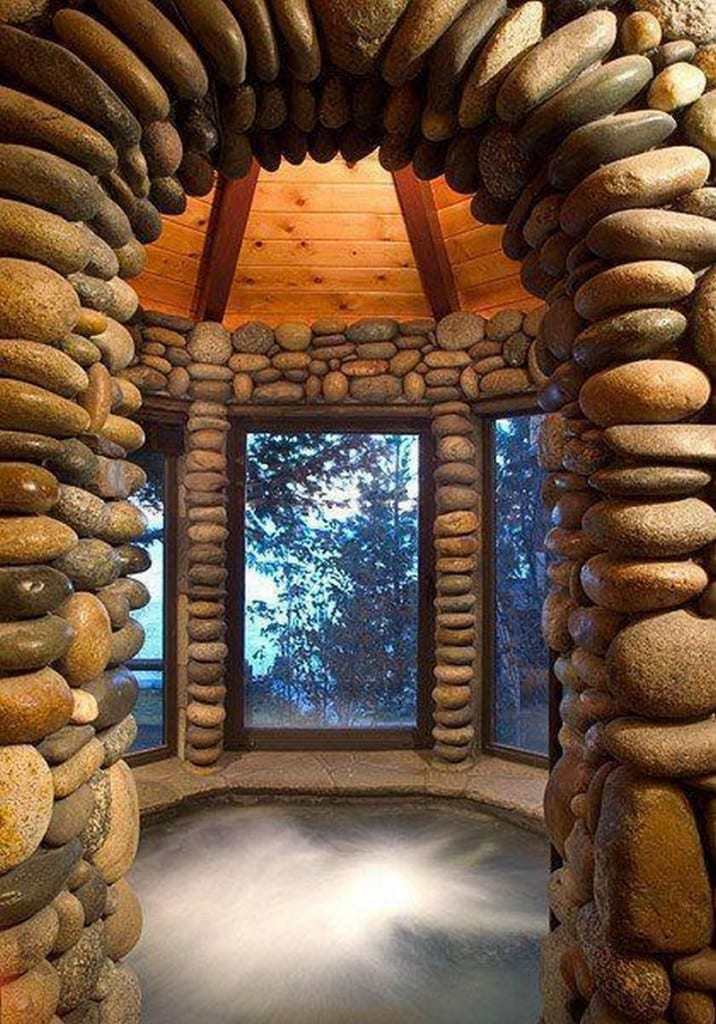 Witches cauldron, hot tub, photo shopping?  I have no idea what the misty thing is, but the stonework is beautiful.