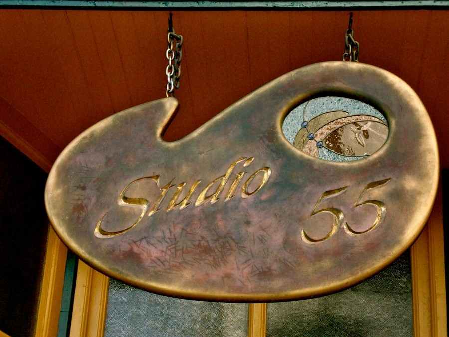 Sign for Studio 55 inspired by the shape of an artist's pallet.
