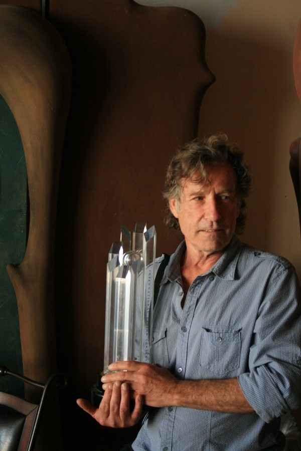 Gregori with his original prototype of award designed for the Corel Draw International Design Contest.