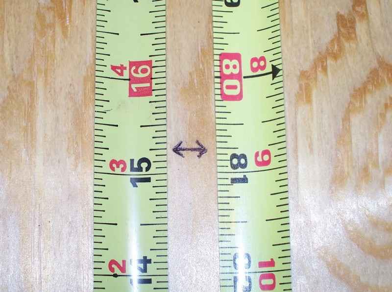 DIY Canned Food Cabinet - Measuring the plywood