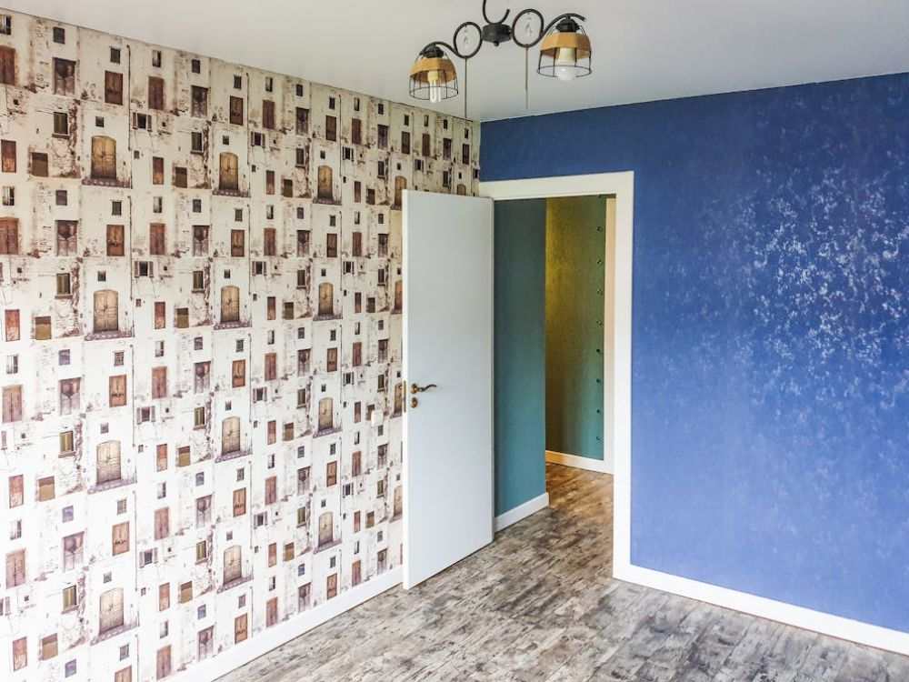An image of a room with wallpaper installed onto the walls.